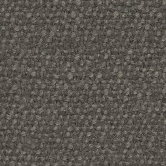 Lario fabric texture, muted gray, dense woven loops; cierre1972 collection catalog 0, speckled granular surface, studio lighting.